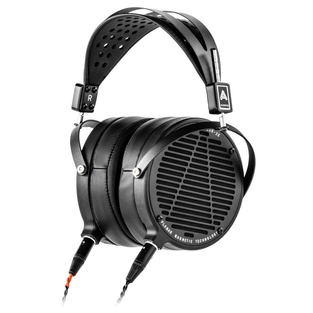 Black over-ear headphones with perforated headband and detachable cables connected to each earcup.