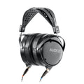 Black over-ear headphones with leather headband and carbon fiber ear cups labeled AUDEZE, attached to dual cables with colored connectors.