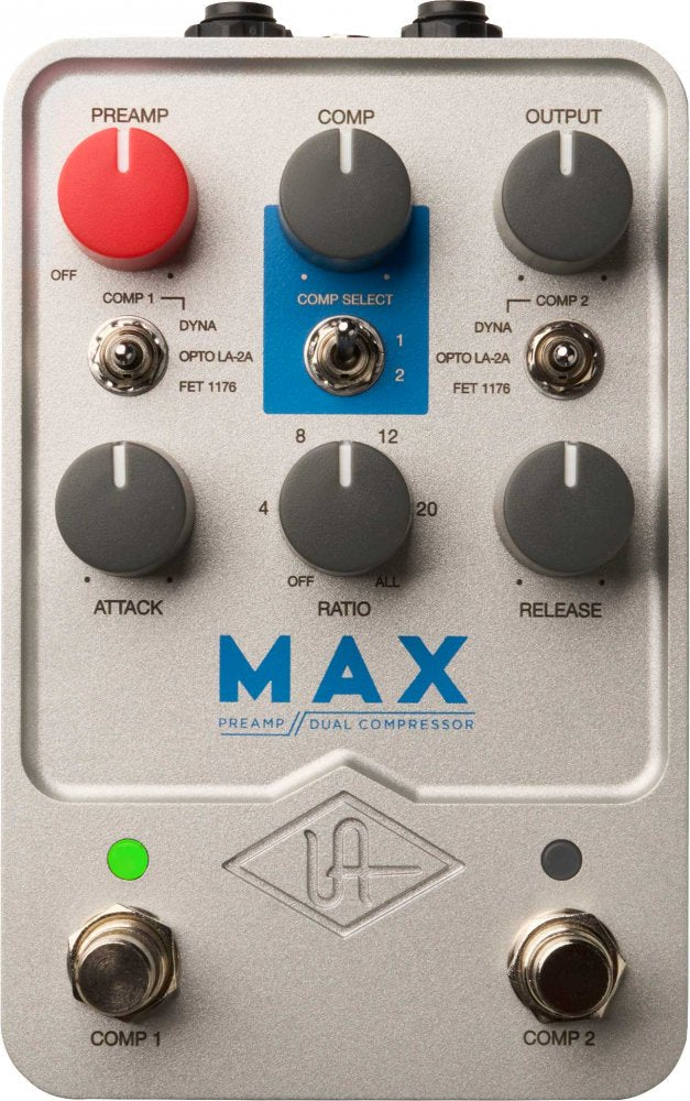 Silver guitar pedal with knobs, toggle switches, and two foot switches labeled COMP 1 and COMP 2