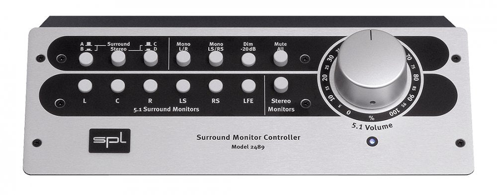 Front panel of a silver SPL Surround Monitor Controller with buttons for speaker selection and a large volume knob.