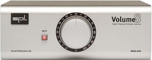 Silver audio device with a large volume dial, mute button, and model label on front panel.