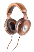 Over-ear wired headphones with brown leather cushions and copper metal frame labeled FOCAL Stellia.