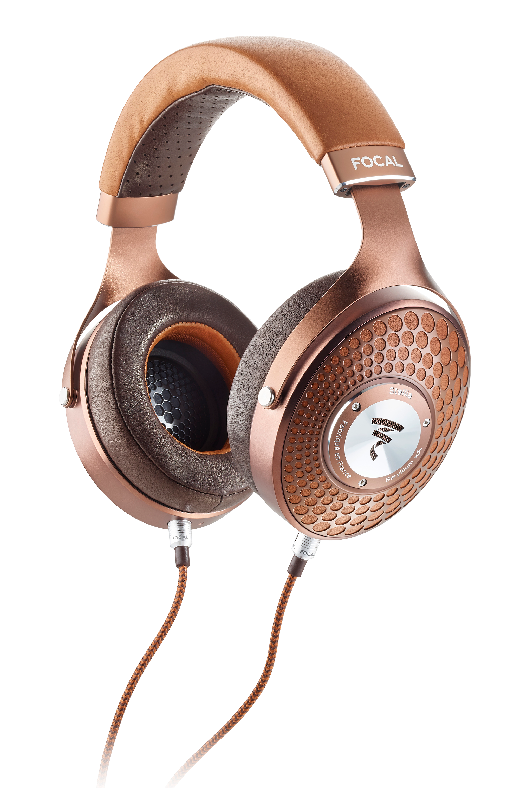 Over-ear wired headphones with brown leather cushions and copper metal frame labeled FOCAL Stellia.