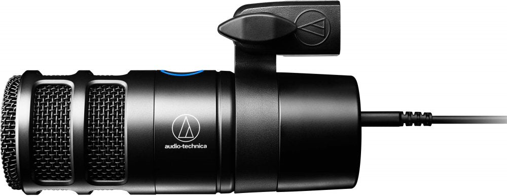 Side view of a black Audio-Technica microphone with a USB cable connected and a rotary knob for adjustment.