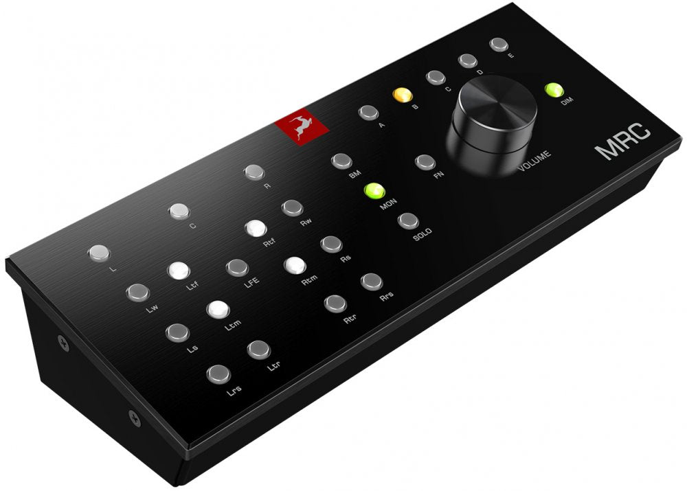 Black metal remote control device with multiple labeled silver buttons and a volume knob, marked MRC.