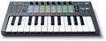 Black and white mini MIDI keyboard controller with pads, knobs, buttons, and pitch/modulation touch strips.