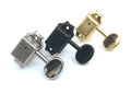 Three vintage style guitar tuning machine heads in silver, black, and gold colors on a white background.