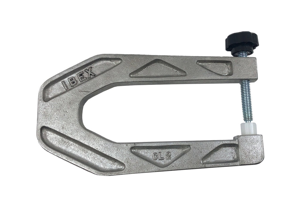 Silver metal clamp with black rotary knob and white plastic spacer part, marked IBEX and CL 2.
