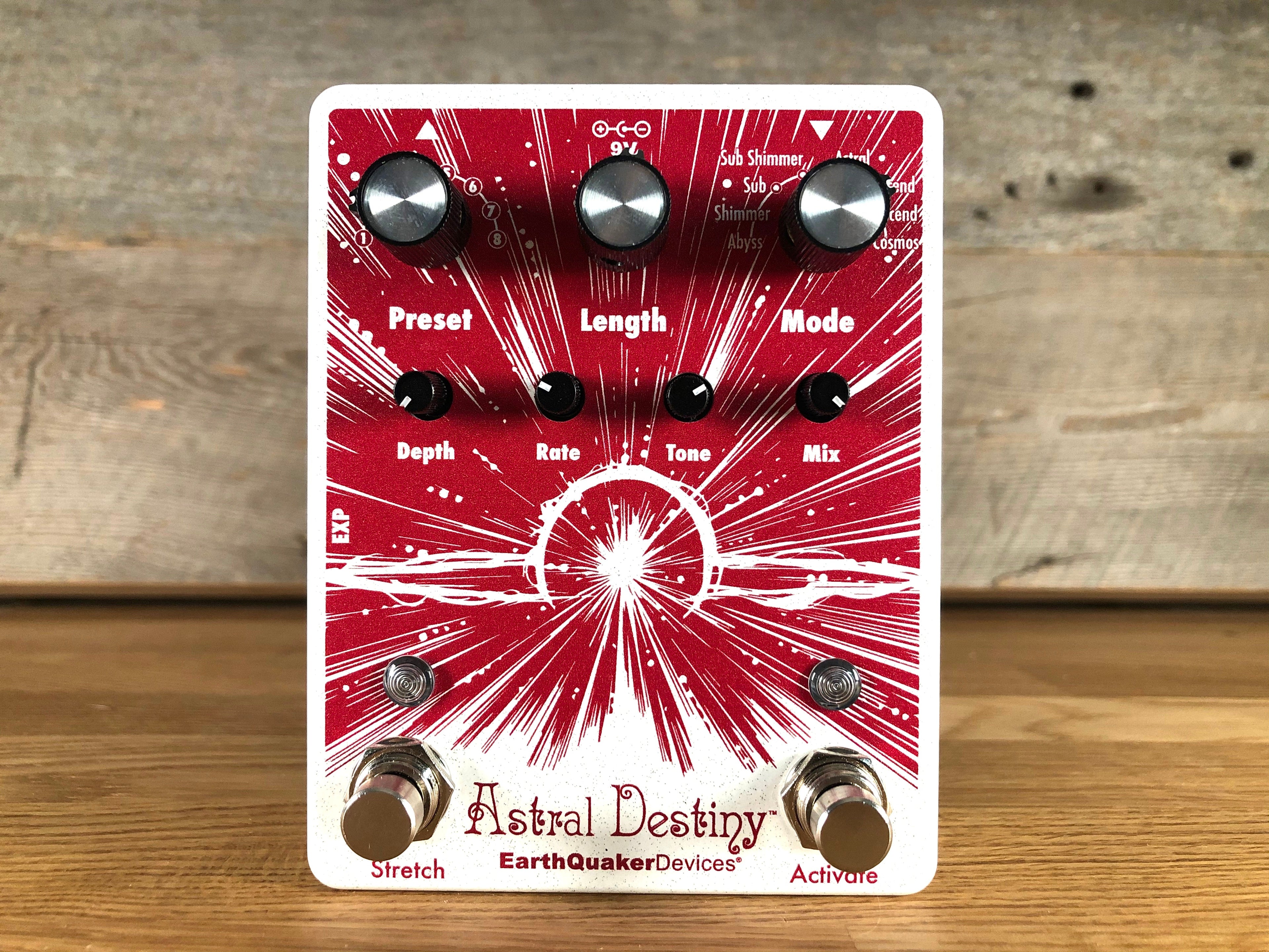 A white and red EarthQuaker Devices Astral Destiny guitar effects pedal with multiple knobs and two footswitches.