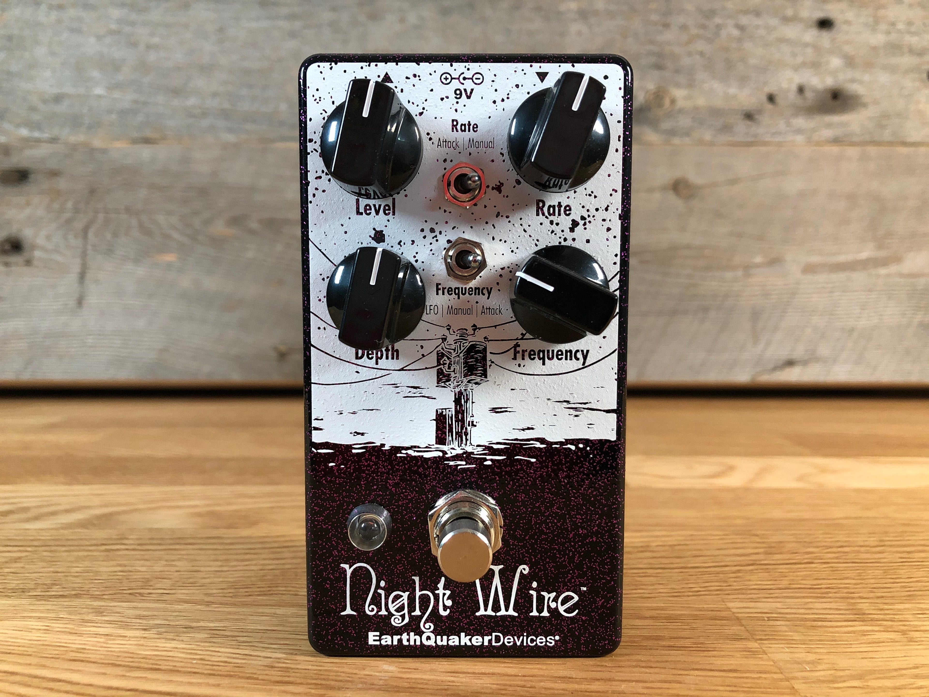 EarthQuaker Devices Night Wire pedal with four knobs, two toggle switches, and one footswitch on wood surface.