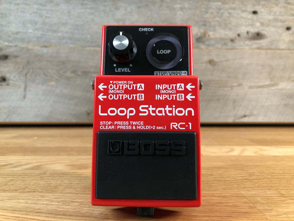 Red Boss RC-1 Loop Station guitar pedal with one knob, footswitch, and input/output jacks.