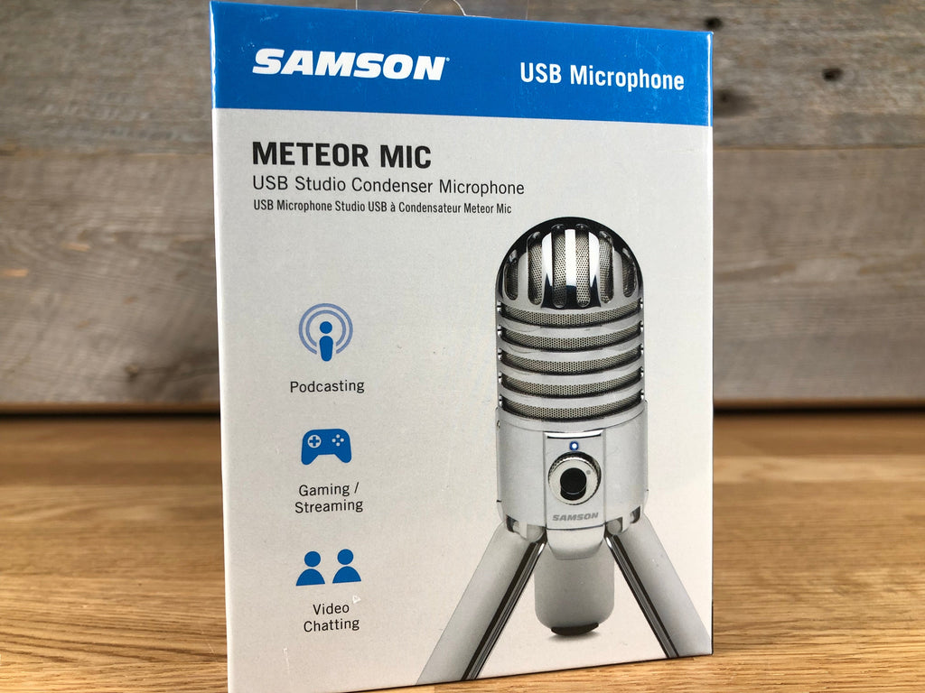 Box packaging of a Samson Meteor Mic USB studio condenser microphone showing the microphone image and usage icons.