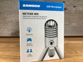 Box packaging of a Samson Meteor Mic USB studio condenser microphone showing the microphone image and usage icons.