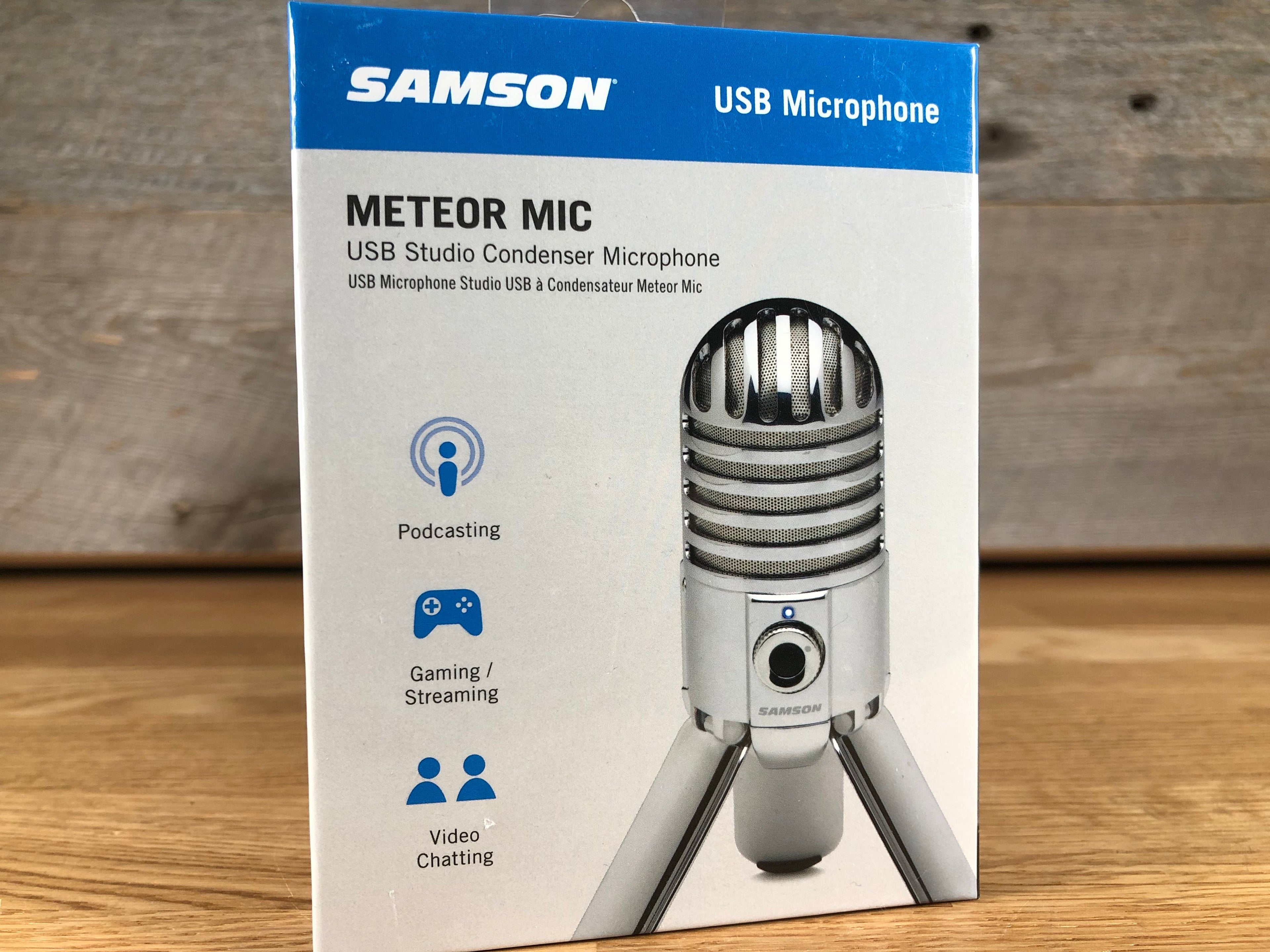 Box packaging of a Samson Meteor Mic USB studio condenser microphone showing the microphone image and usage icons.