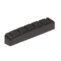 Black slotted plastic guitar nut with six slots, viewed at an angled perspective on a white background.