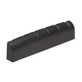 Black slotted guitar nut with six string grooves.