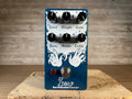 Blue and white EarthQuaker Devices Zoar guitar effects pedal with six knobs and one foot switch.