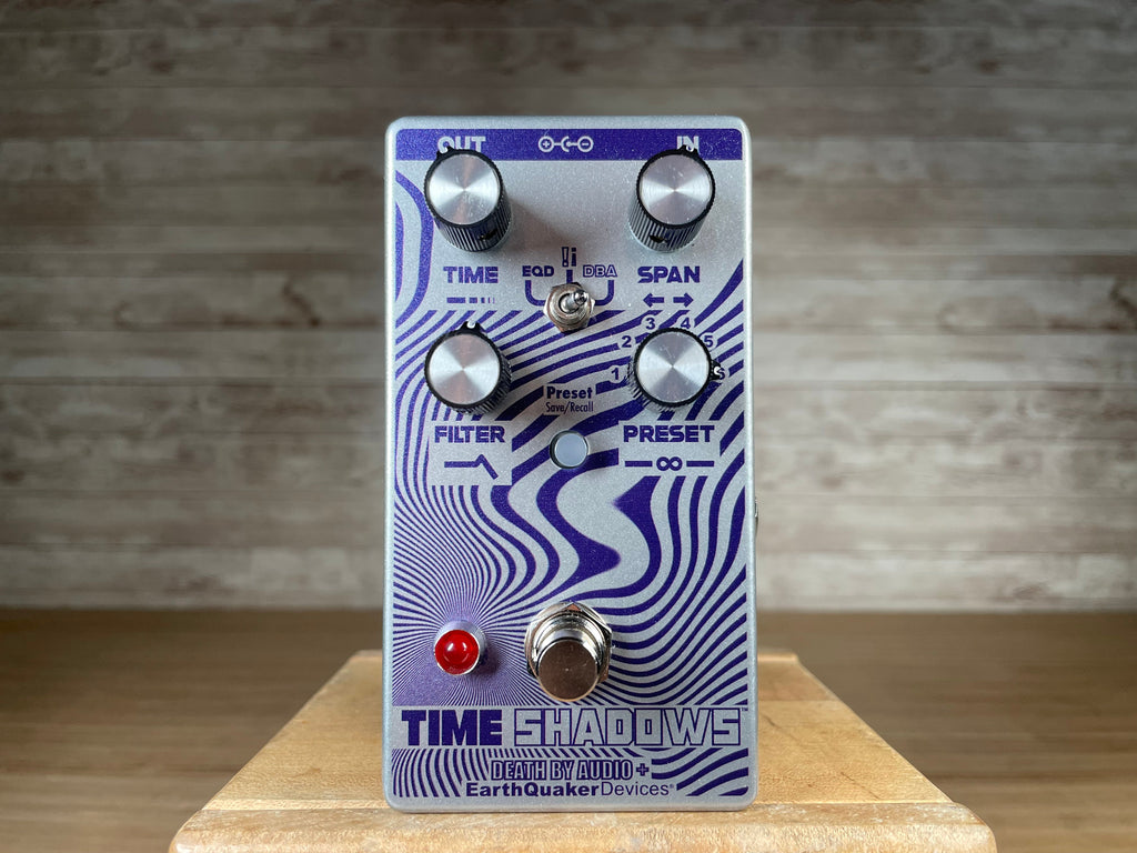 Silver and purple EarthQuaker Devices Time Shadows effects pedal with knobs for Time, Span, Filter, and Preset, toggle switch, and footswitch.