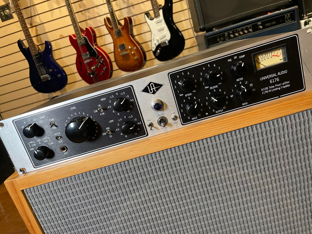 Front panel of a Universal Audio 6176 audio processor with knobs, switches, and a VU meter.