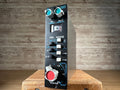 Black studio rack unit with various knobs and switches labeled 525 and compression gain settings