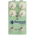 Light green guitar effects pedal with four knobs, two footswitches, toggle switch, and Diamond Tremolo branding.