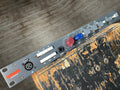 Front panel of a Warm Audio WA73-EQ preamp and EQ unit with knobs, buttons, and input connectors.