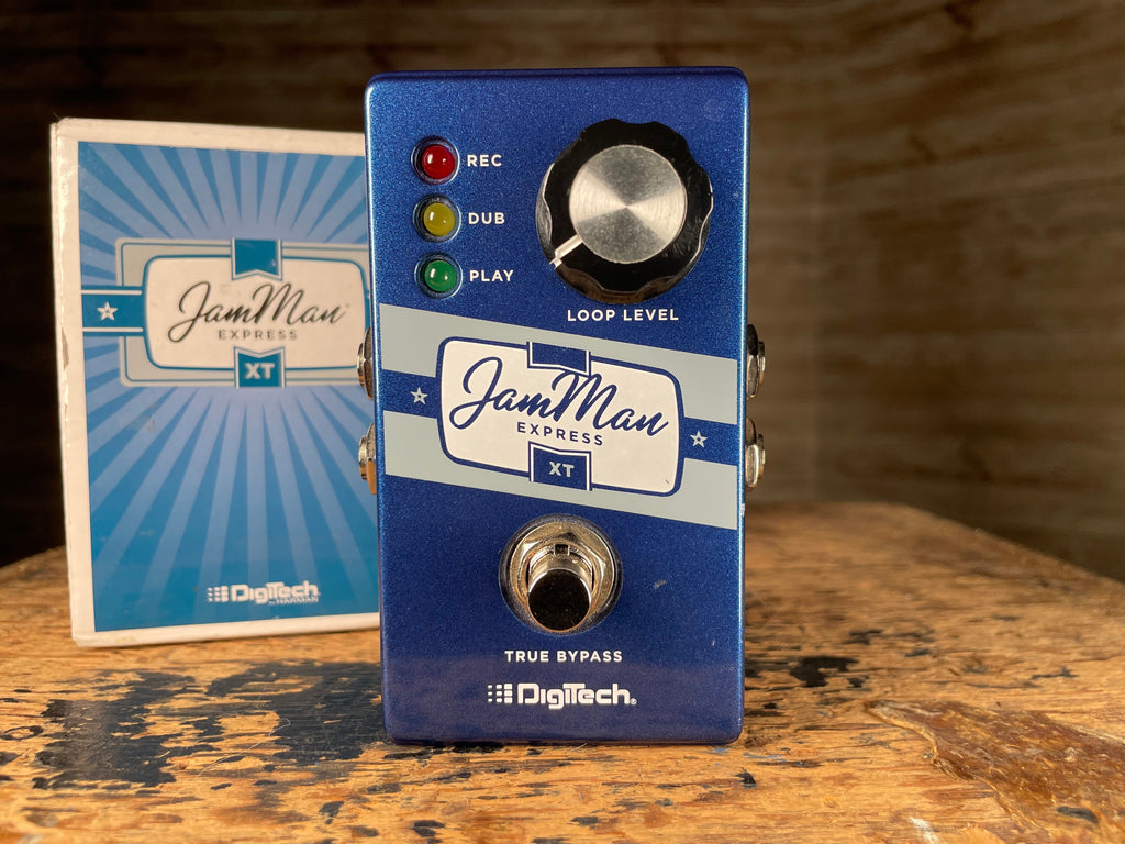 Blue Digitech JamMan Express XT pedal with three indicator lights, one knob, and one footswitch, shown with its box