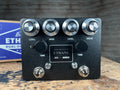 Black Browne Amplification Ethane dual overdrive pedal with knobs, switches, and label, with blue box in background.