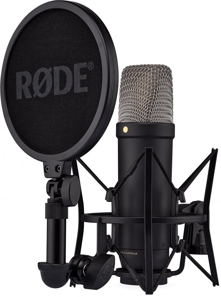 Black condenser microphone with metal mesh head, shock mount, and attached pop filter with RØDE logo.