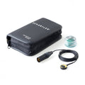 Pickup device with cable and XLR-style connector, black carrying case, and small container with green pads on white background.