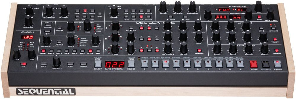 Black synthesizer with multiple knobs, buttons, digital displays, and wood side panels placed on a white background.