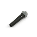 Black handheld microphone with a silver mesh grille and an on/off switch lying at an angle on a white background.