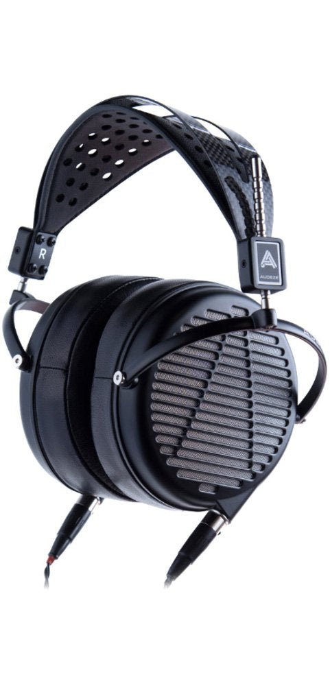 Black over-ear headphones with perforated leather headband and dual mini XLR audio connectors.