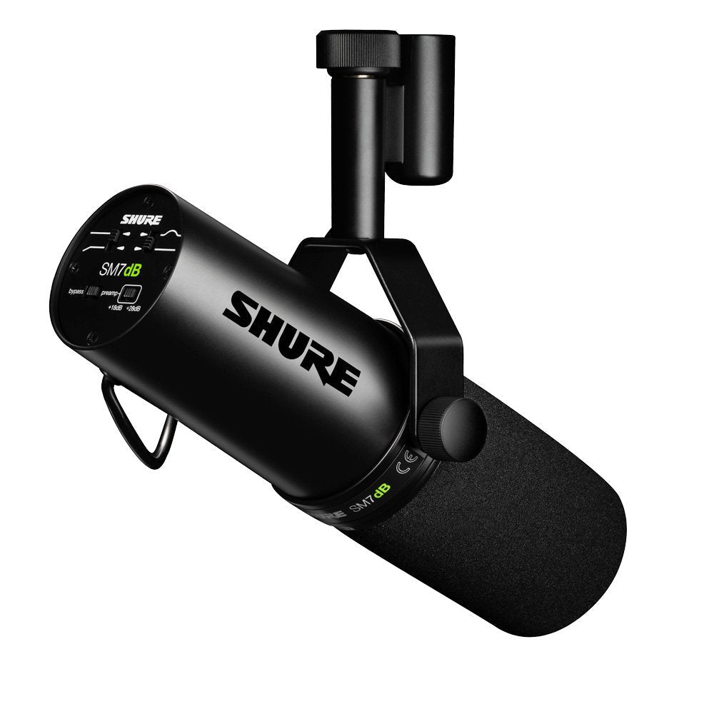 Black Shure microphone with foam windscreen and adjustable mounting bracket with switches visible on rear panel.