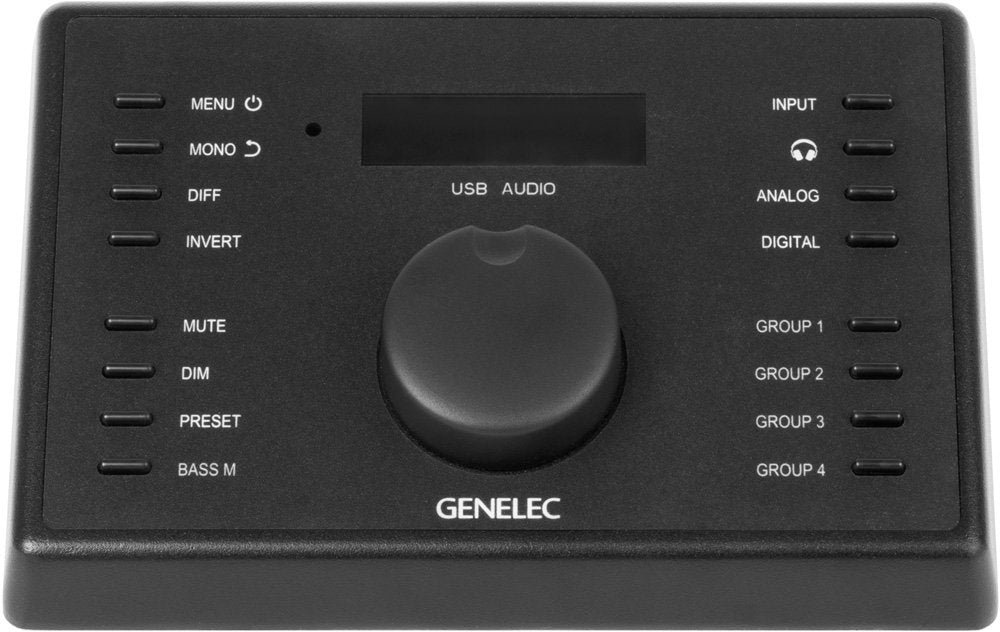 Black GENELEC monitor controller with central rotary knob and multiple push buttons labeled for audio functions.