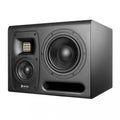 Black studio monitor speaker with three visible drivers and bass reflex port on front panel.