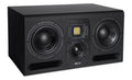 Black studio monitor speaker with two large woofers, a midrange driver, and a yellow air motion transformer tweeter