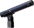 Black cylindrical microphone with grille and attached mount clip with visible brand name Audio-Technica.