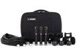 Three small black microphones with accessories and a black carrying case with TELEFUNKEN logo