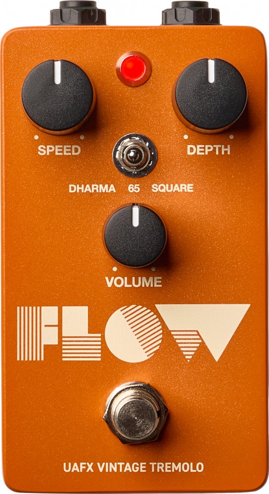 Orange guitar effects pedal with three knobs, a toggle switch, a footswitch, and red LED indicator light.