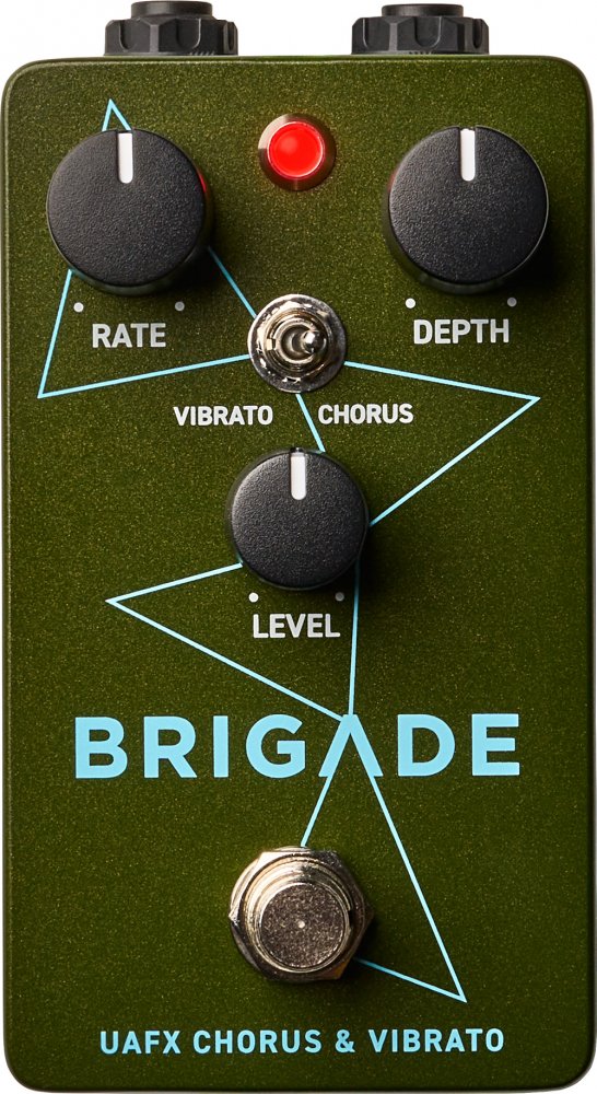 Olive green guitar pedal with three knobs, a toggle switch, a red LED, and a footswitch labeled Brigade UAFX Chorus & Vibrato.