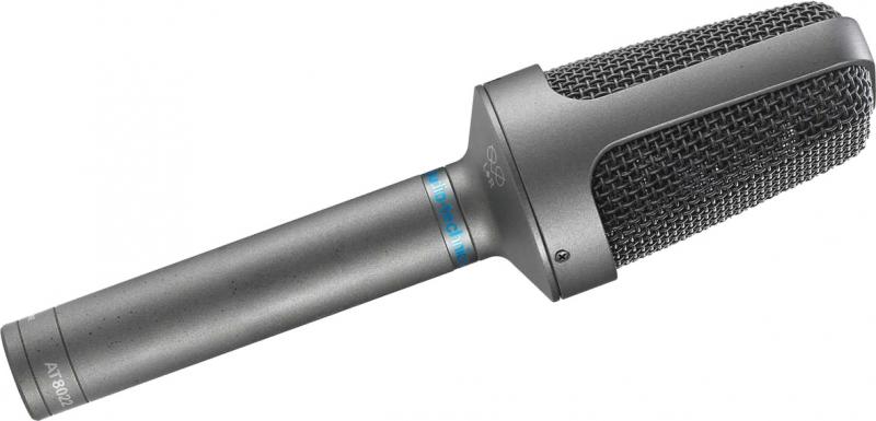 Black and gray shotgun microphone with mesh grille and model number AT 8022 visible.