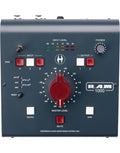 Top view of a dark gray audio monitor controller with buttons, a large rotary knob, and input level LEDs.