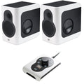 Two white and black studio monitor speakers with a control unit featuring a rotary knob and display showing 66.