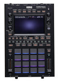 Top view of a KORG KAOSS Replay sampler with pads, knobs, buttons, sliders, and a digital display screen.