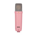 Pink condenser microphone with metal mesh grille and RØDE logo on body.