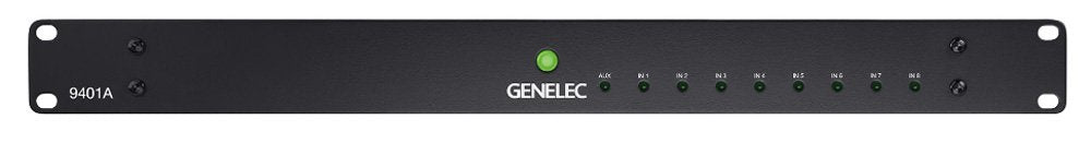 Front panel of a black rack-mount device labeled 9401A by Genelec with multiple small indicator lights and one green illuminated button.