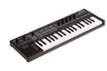Black MIDI controller keyboard with knobs, buttons, pads, and touch strips, branded ARTURIA KeyStep Pro.