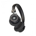 Black over-ear headphones with foam ear cushions and visible control buttons on one earcup.