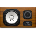 Front view of a studio monitor speaker with a wooden finish, large woofer, smaller tweeter, and brand label plate.